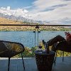 Bill on our porch overlooking the lake and mountains